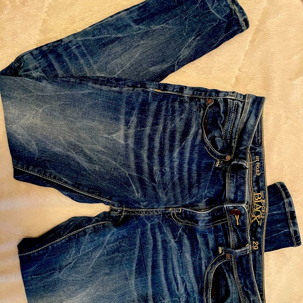 Women’s buckle black skinny jeans size 29